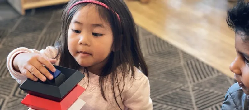 A child building blocks