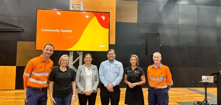 BHP employees smiling for a photo