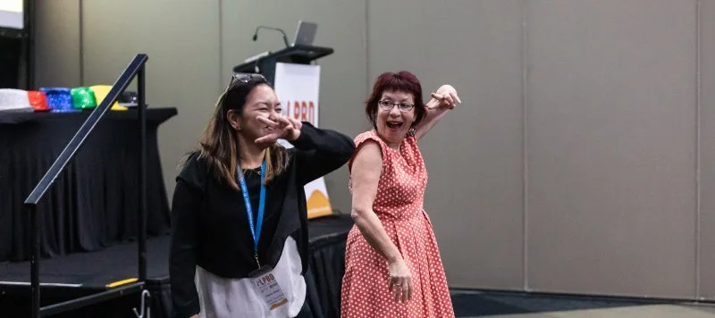 2 women dancing