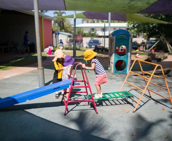 Children playing outside on the playground